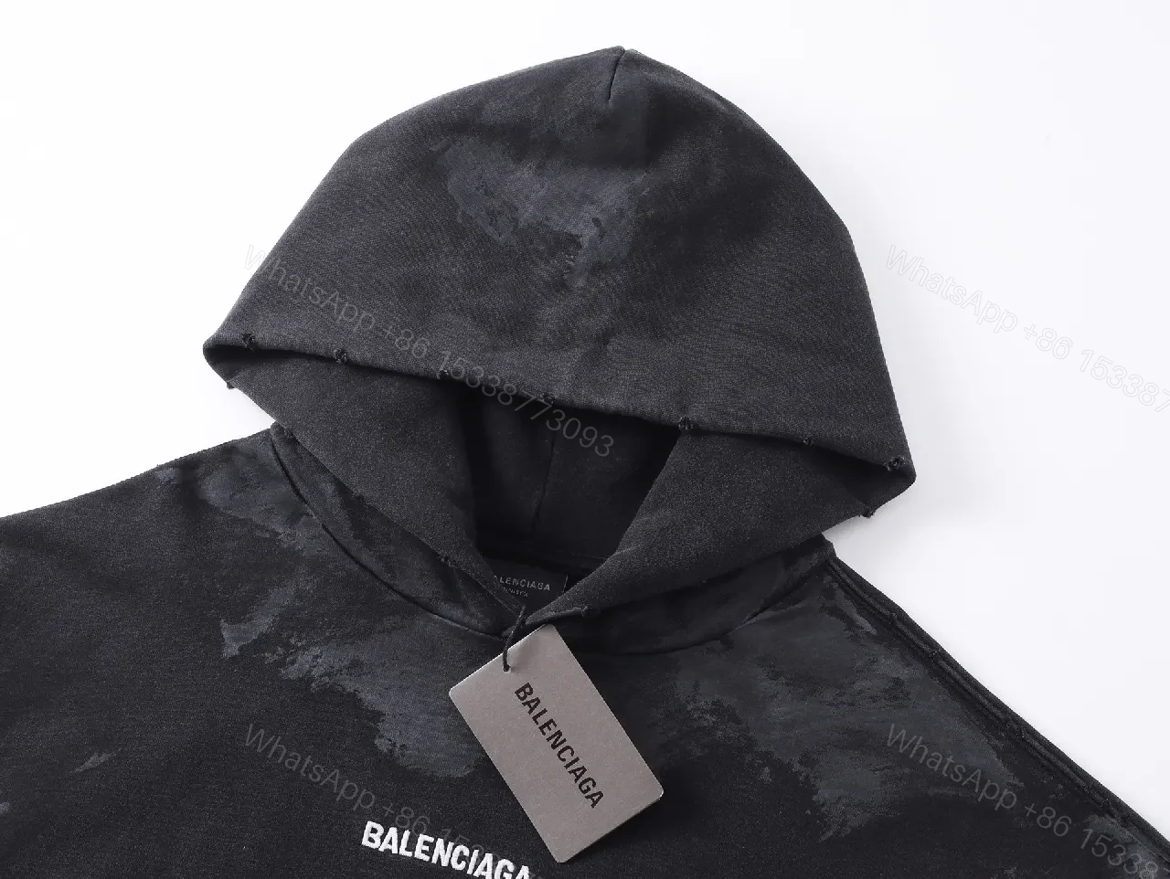View 10 of Bold Tie-Dye Black Hoodie: Signature Details, Streetwear Essential