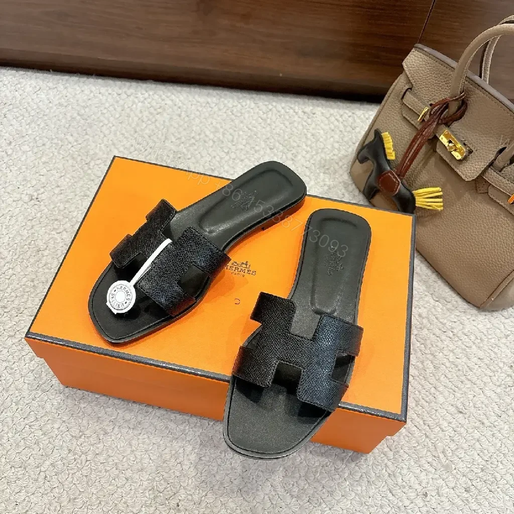 View 5 of Black Leather Minimalist Slides with Signature Cross‐Band