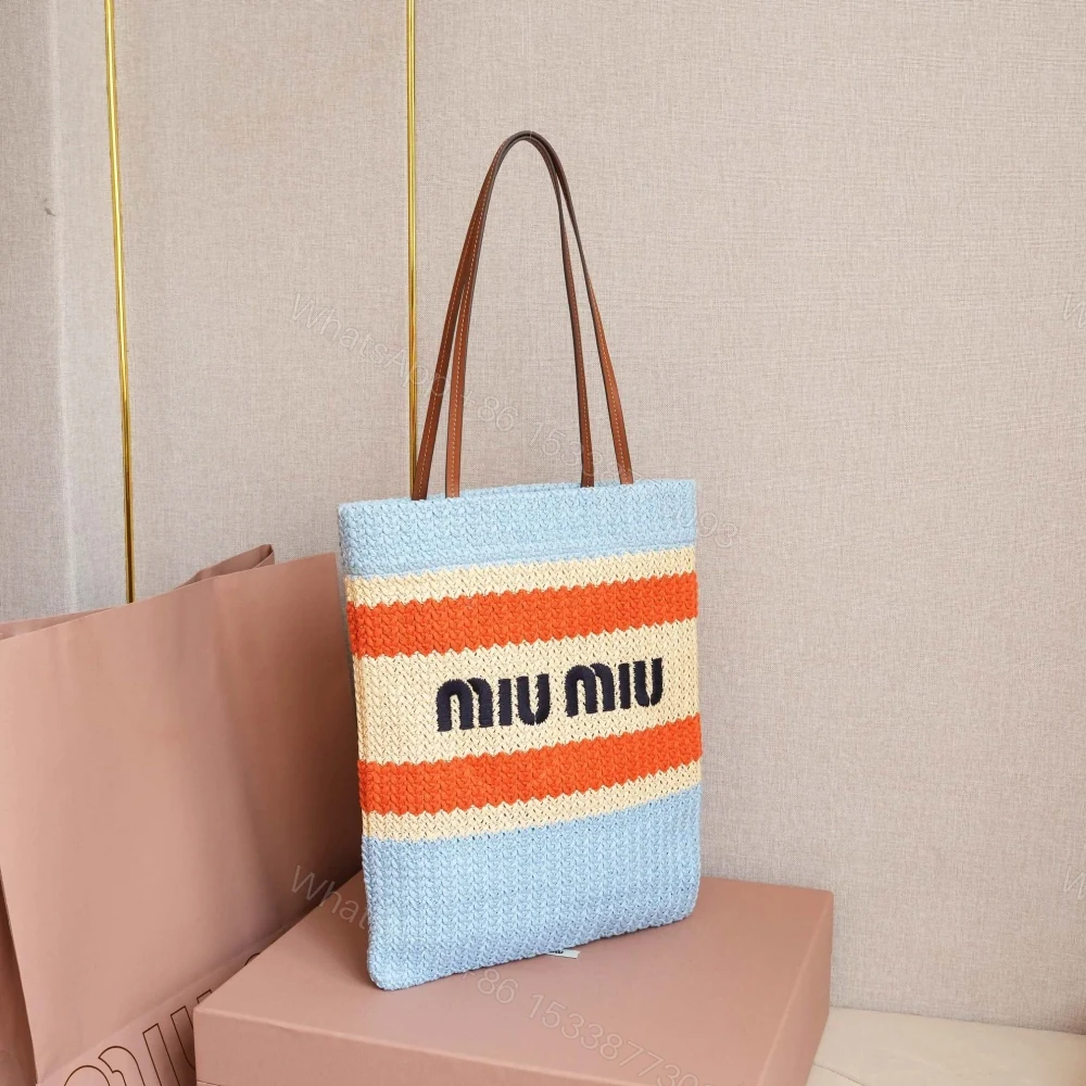 View 4 of 高仿miumiu*5BG248拼色LOGO稻草柳條包藍色免檢版