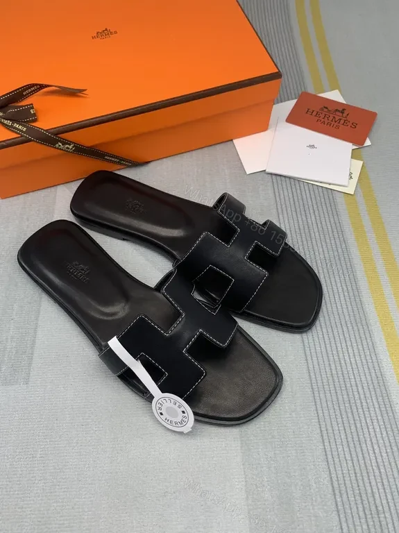 HermÃ ̈s Oran Sandals Black Calfskin â€“ Minimalist H-Strap Luxury — view 1