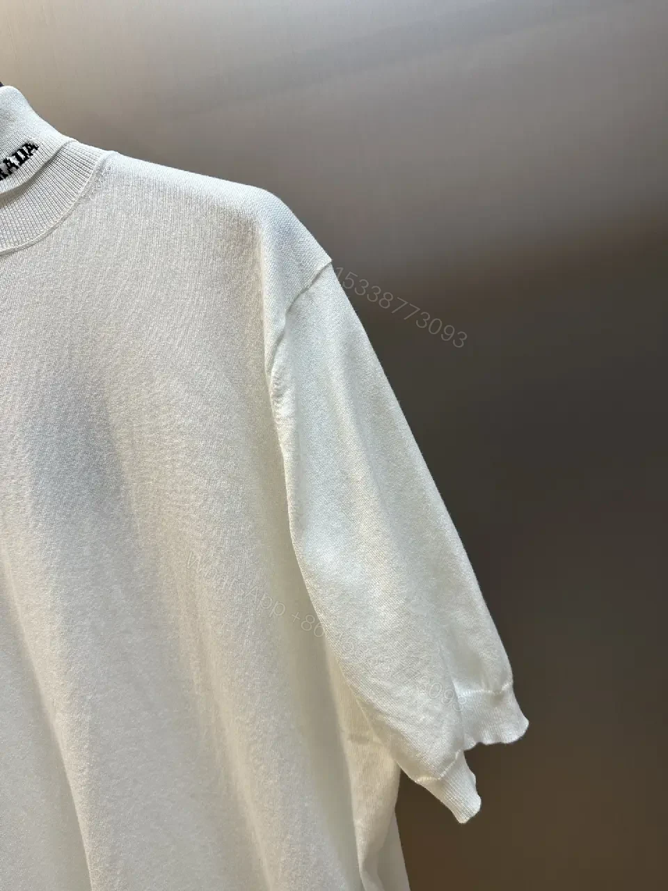 View 4 of Off-White Knit Roll-Neck Tunic: Luxe Casual Elegance