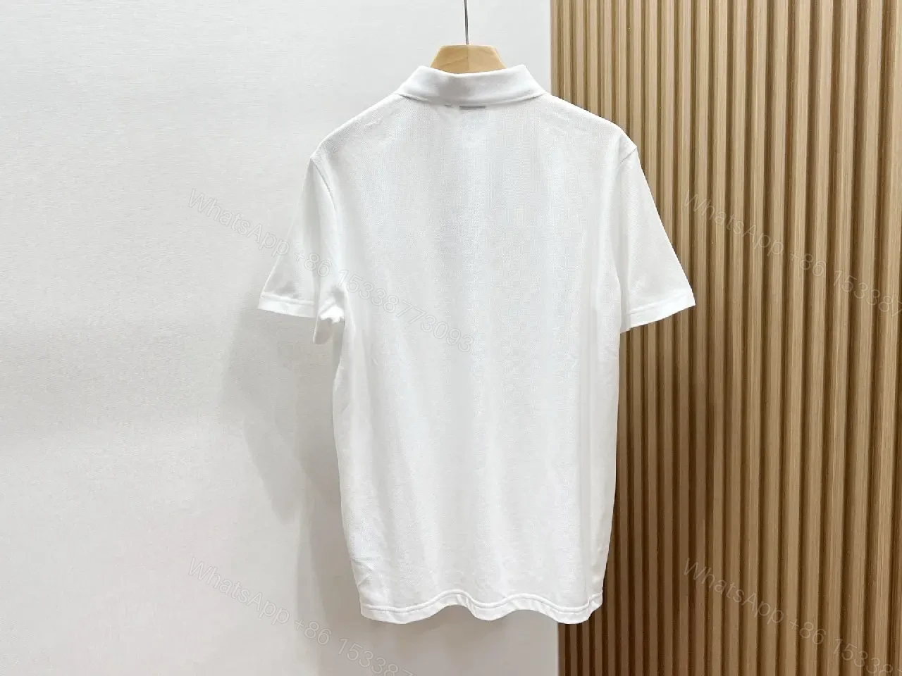 View 6 of Minimalist White Cotton Polo with Subtle Detailing
