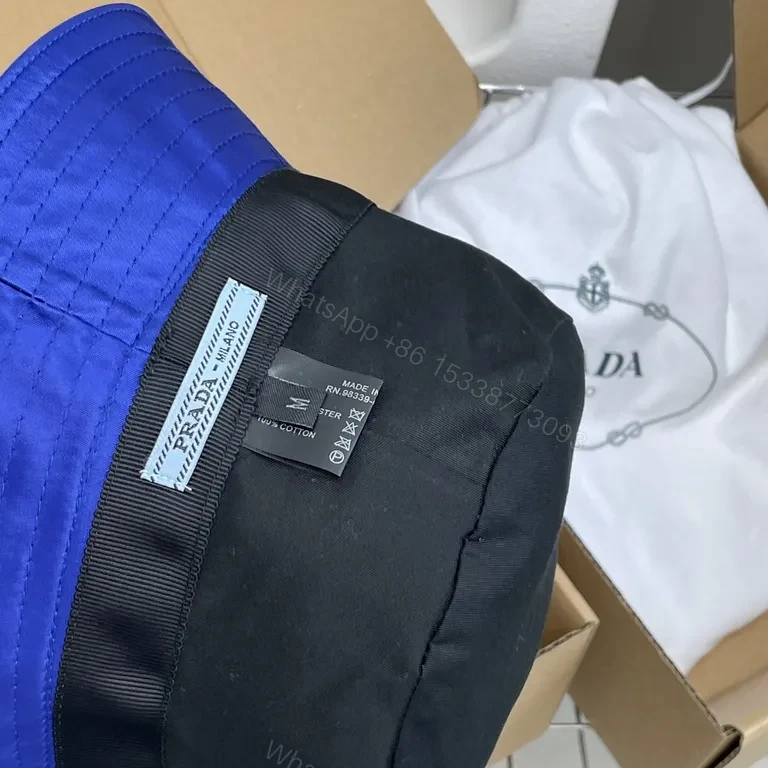View 9 of Bold Cobalt Blue Nylon Bucket Hat â€“ Luxe Satin Finish, Prada Patch
