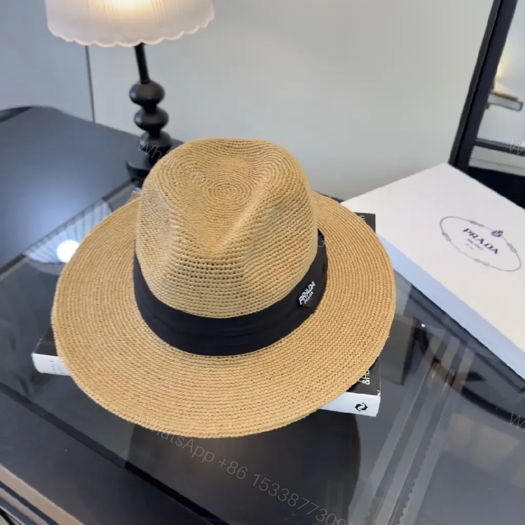 View 6 of Light Tan Straw Wide-Brimmed Floppy Hat with Black Ribbon Band