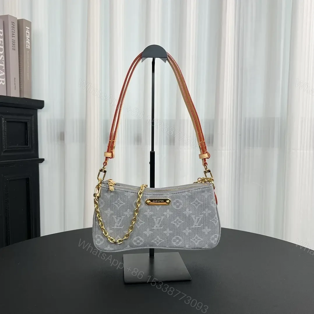 Louis Vuitton Liv Pochette in Washed Denim — view 1