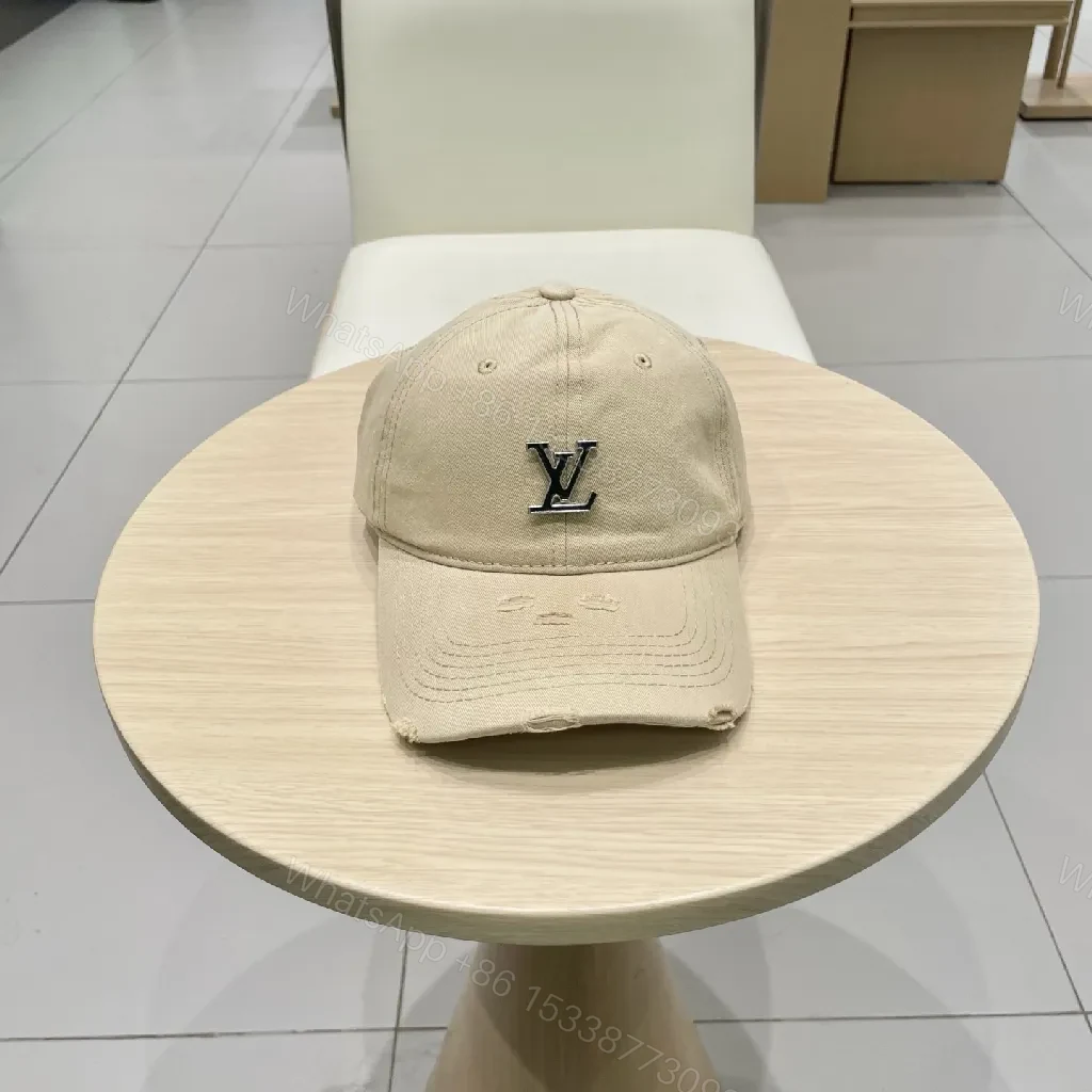 View 8 of Beige Cap with Textured Panels, Subtle LV-Inspired Emblem, Casual Luxury