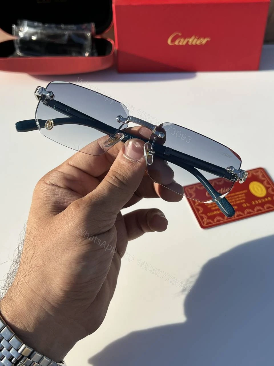 View 3 of First Copy Cartier Rimless Blue Tint Sunglasses Silver Frame Unisex UV Protection