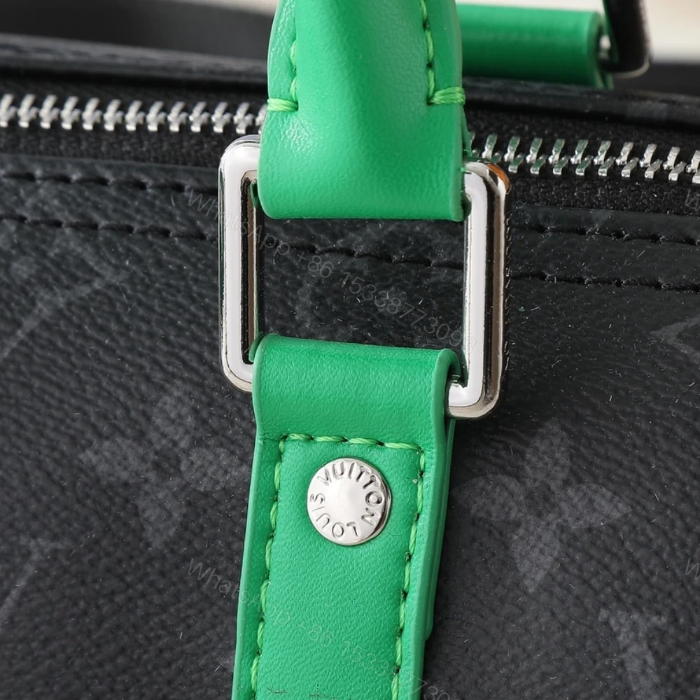View 7 of Louis Vuitton Keepall Bandoulière 25 Bamboo Green 25Cm M25885