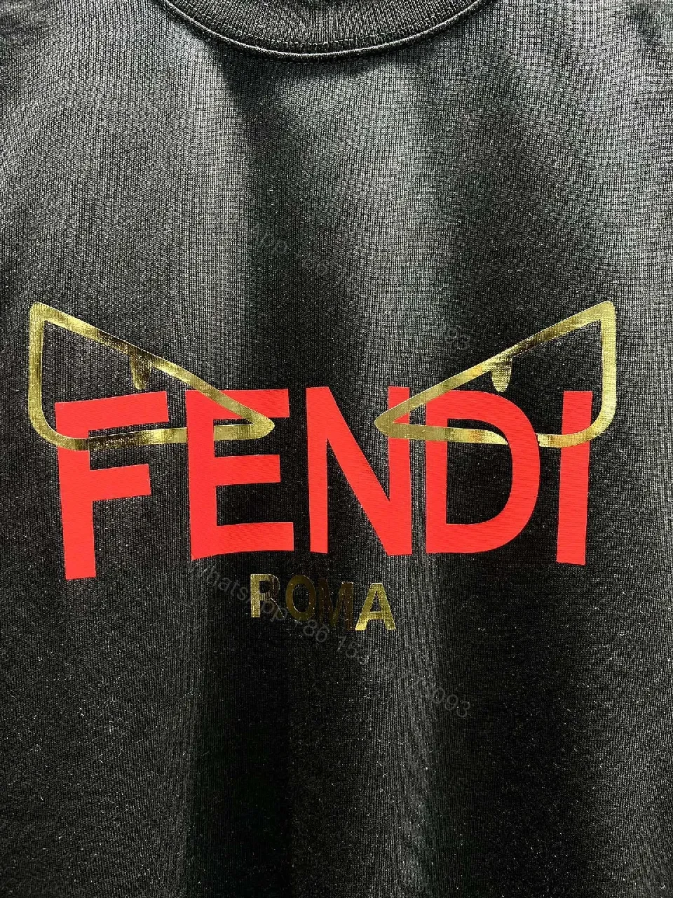 View 6 of Bold Black Tee with Red Fendi Logo Film-Glow