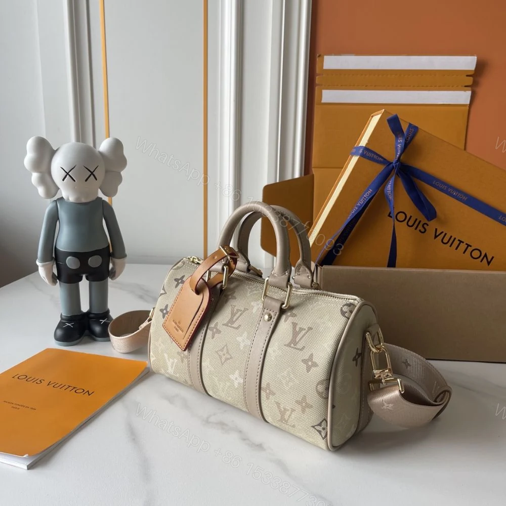 View 2 of Louis Vuitton Keepall Bandoulière 25 Sand Beige 25Cm M29272