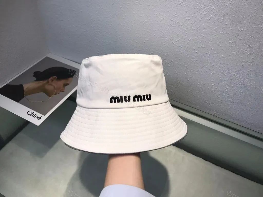 View 6 of Crisp White Miu Miu Bucket Hat: Iconic Logo Shield