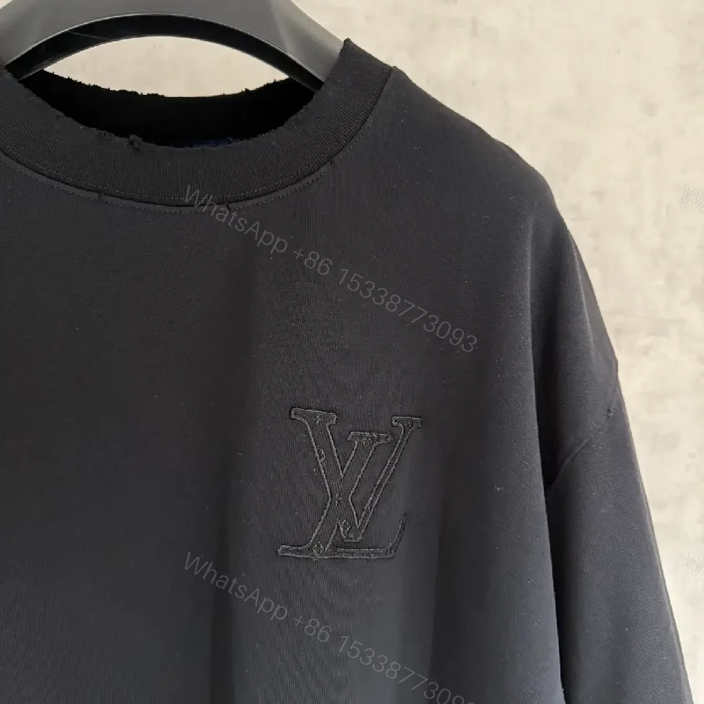 View 2 of Oversized Cotton Tee with Subtle Embroidery, Minimalist Luxe + Black