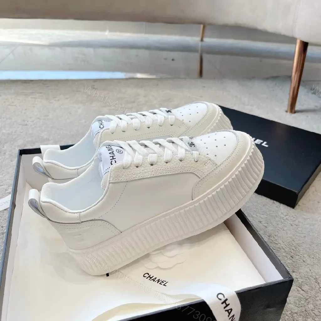 View 10 of Minimalist White Platform Sneakers with Subtle Accents