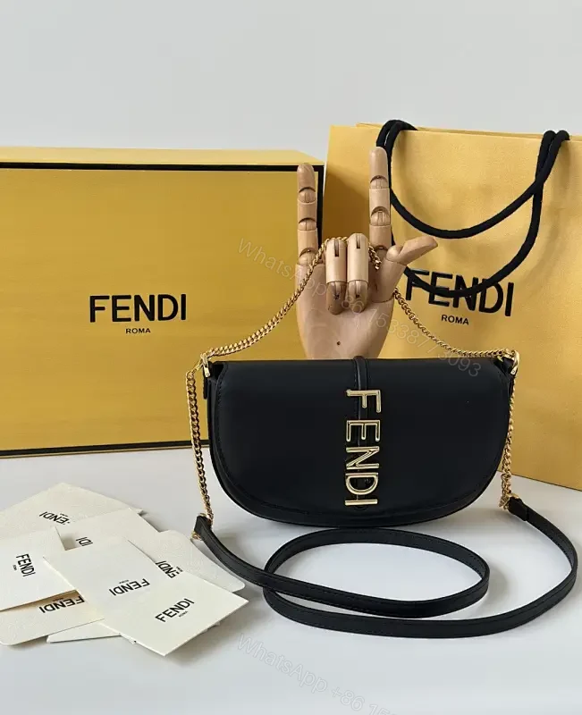 Chic Black Leather Shoulder Bag with Gold Hardware, Compact Luxury — view 1