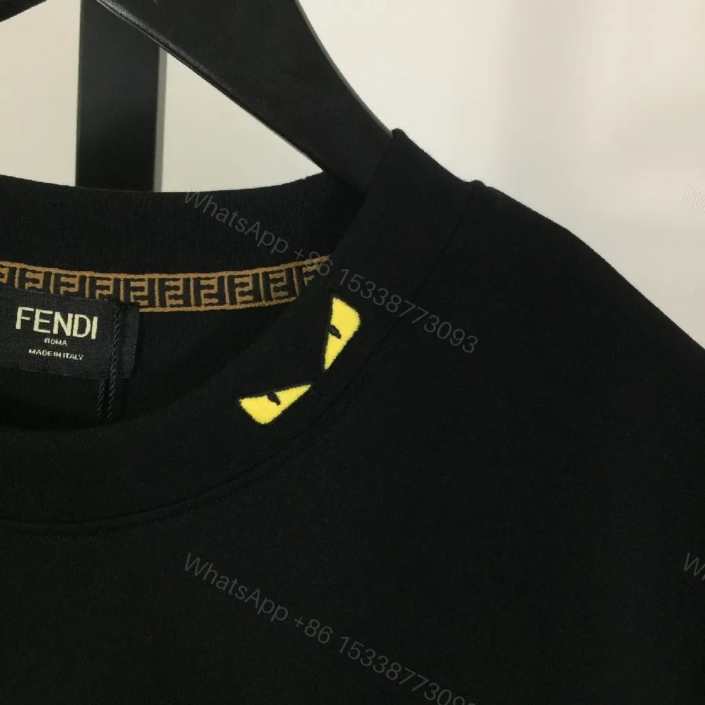 View 6 of Black Cotton T-Shirt + Minimalist Logo + Modern Crew Neck + Subtle Luxe Detail + T-Shirt