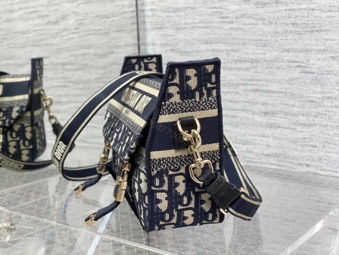 View 2 of Navy-cream Jacquard Messenger Bag with Gold Hardware