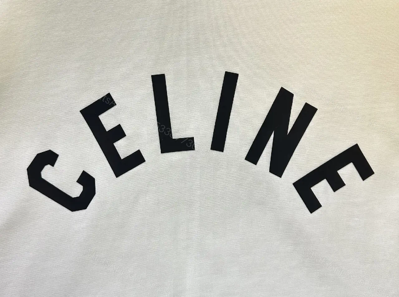 View 11 of Oversized White Cotton Tee with Bold CELINE Arch Graphic