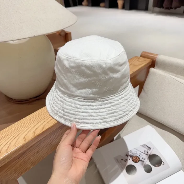View 7 of White CELINE Logo Bucket Hat: Clean Minimal Luxury
