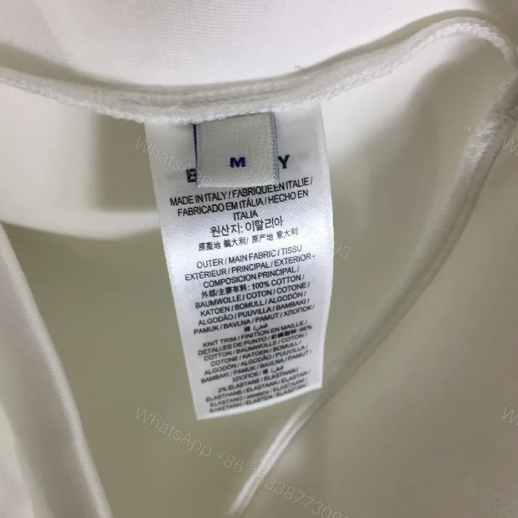 View 7 of Neutral Off-White Luxury Hoodie with Crest Embroidery