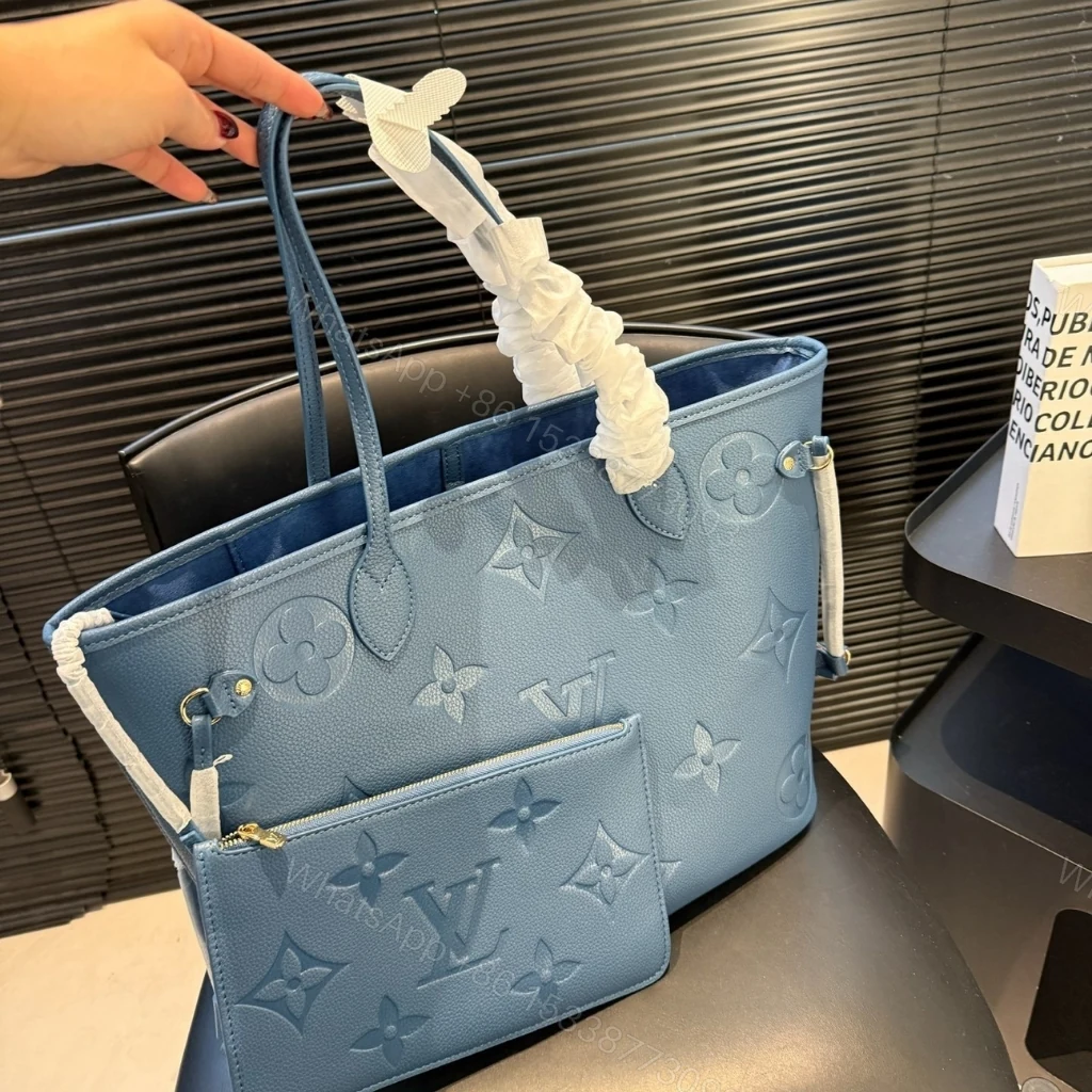 View 8 of Louis Vuitton Neverfull MM Tote Bag Monogram Empreinte Bleu Jean 31cm M27358