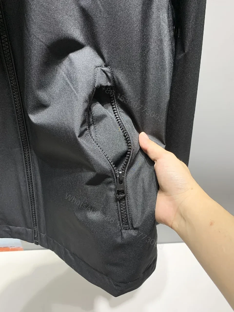 View 9 of Black Packable Windbreaker: Modern, Lightweight Protection