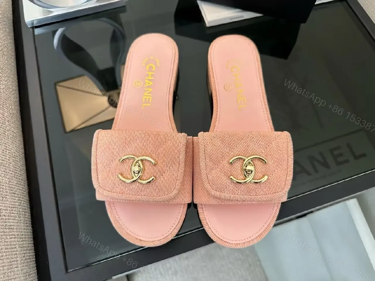 View 4 of Soft Pink Slip-On Sandals with Gold Logo – Luxury Comfort