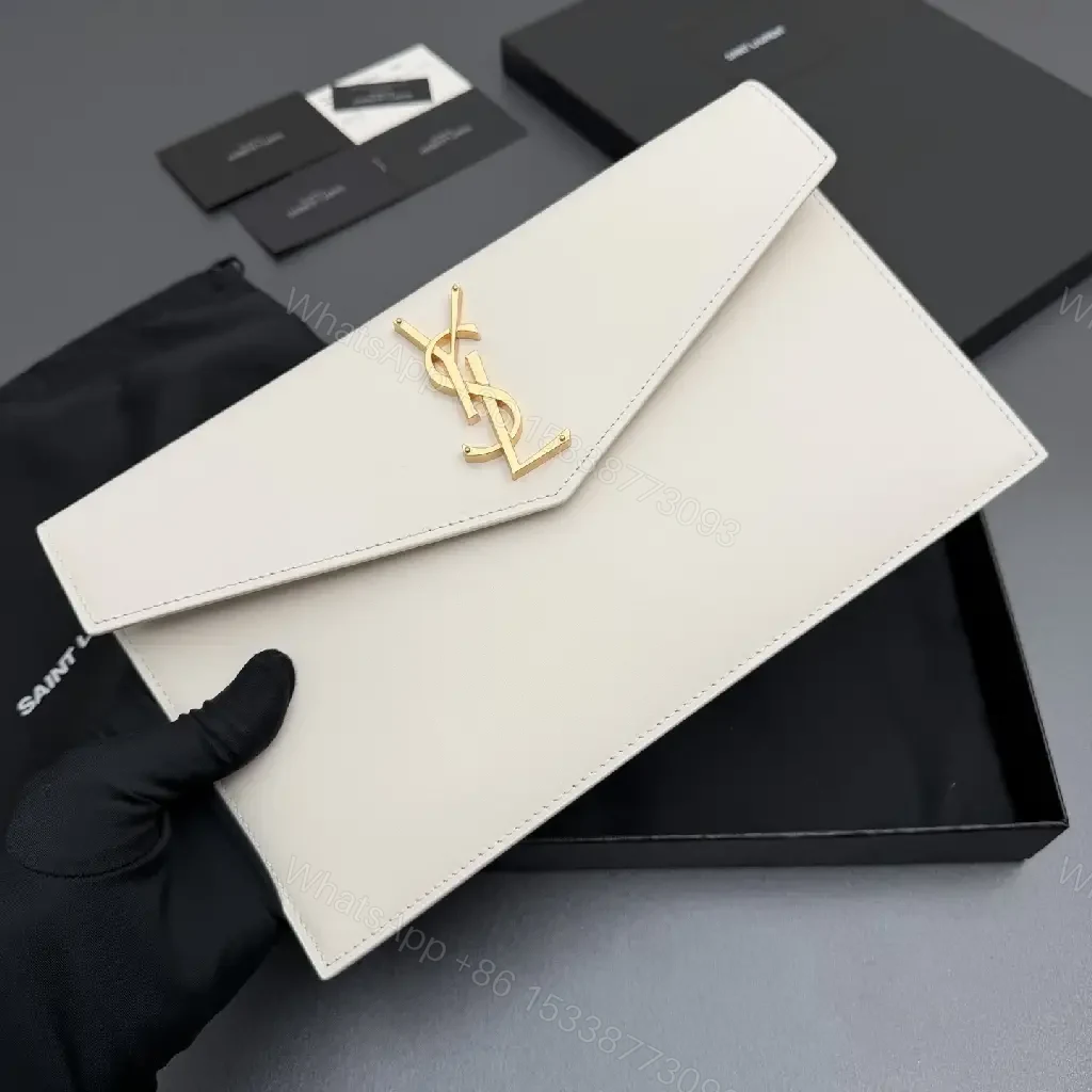 View 3 of Ivory Leather Envelope Clutch with Gold-Tone Hardware, Minimalist Chic