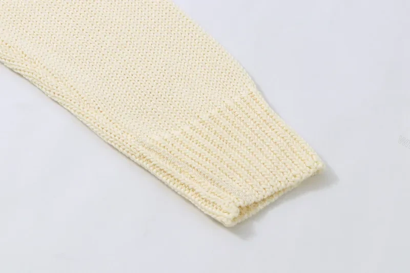 View 9 of Cozy Graphic Knit Pullover - Off-White Style, Relaxed Fit, Textured
