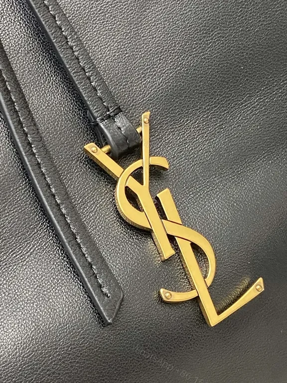 View 6 of Minimalist Black Leather Drawstring Bucket Bag with Gold Hardware