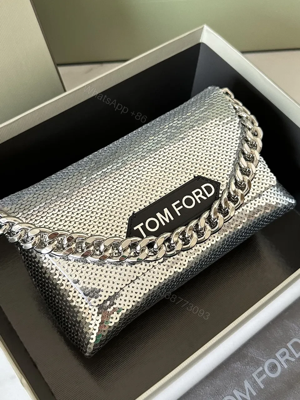 View 8 of Chic Metallic Crossbody Clutch: Bold Chain Luxury