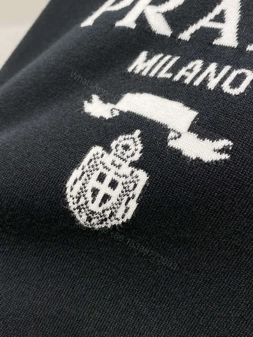 View 11 of Minimalist Cotton Tee with Crest – Elevated Everyday Essential