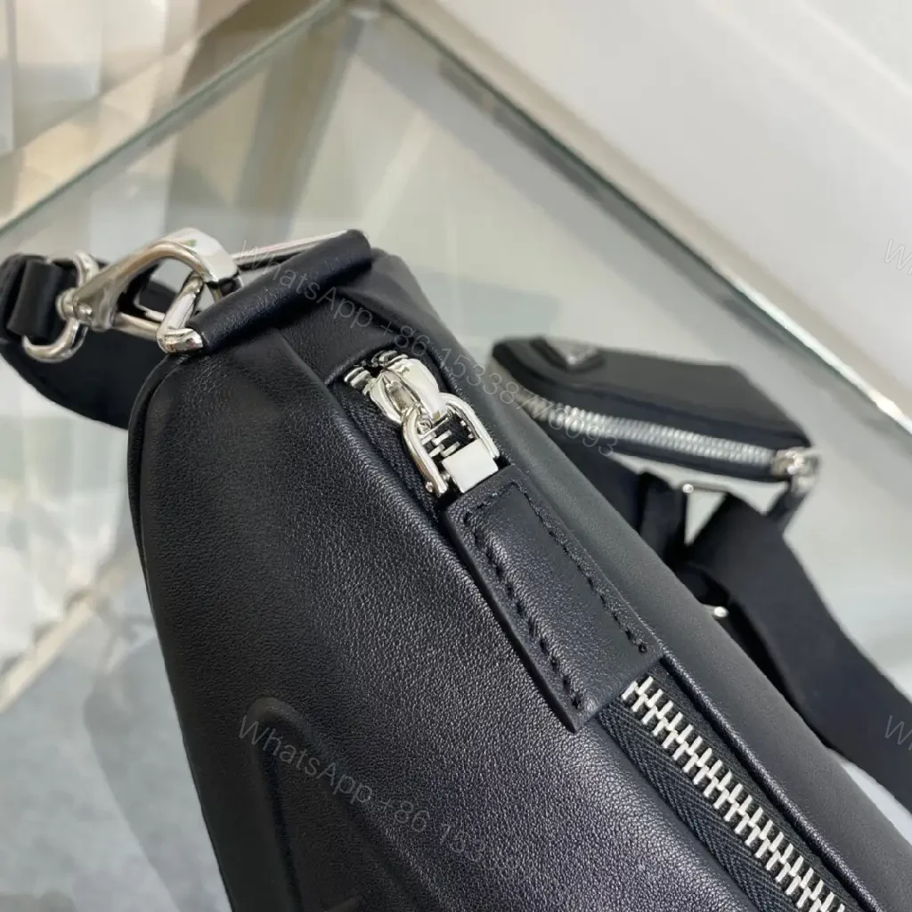 View 4 of Triangular Black Leather Belt Bag — Modern Minimalist Luxury Perforated Edge