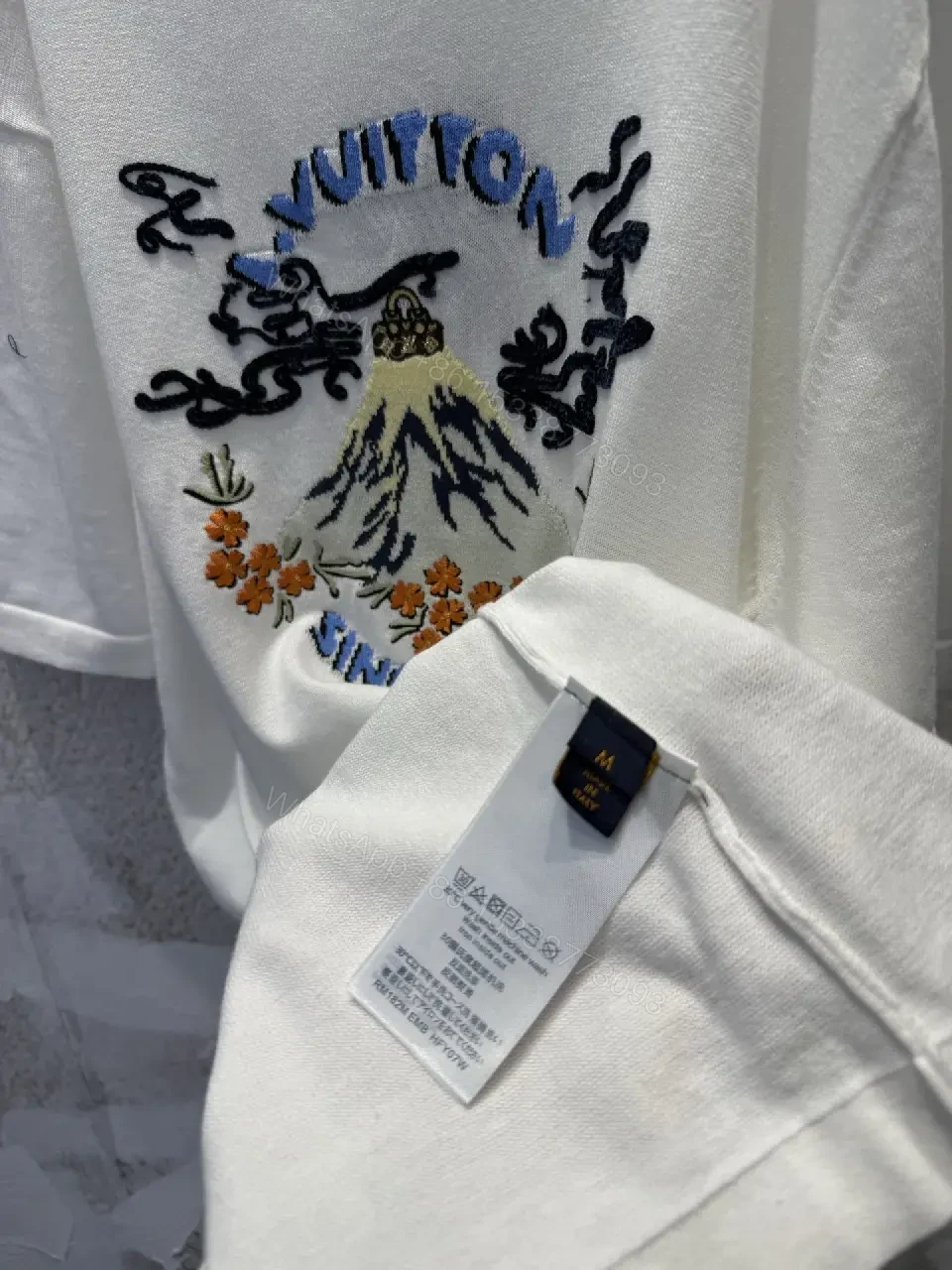 View 6 of White Embroidered Graphic Tee with Luxe Motif - Casual Luxury Top