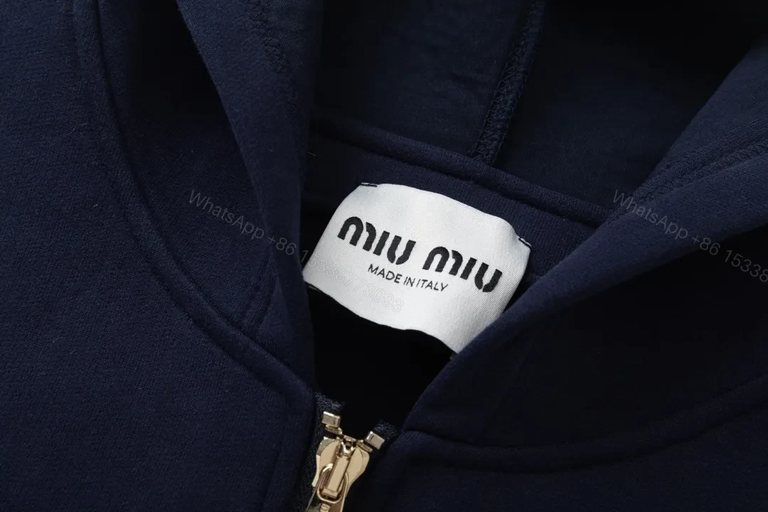 View 9 of Minimalist Navy Zip Hoodie—Cotton Blend, Modern Fit, Logo Accent, Hoodie