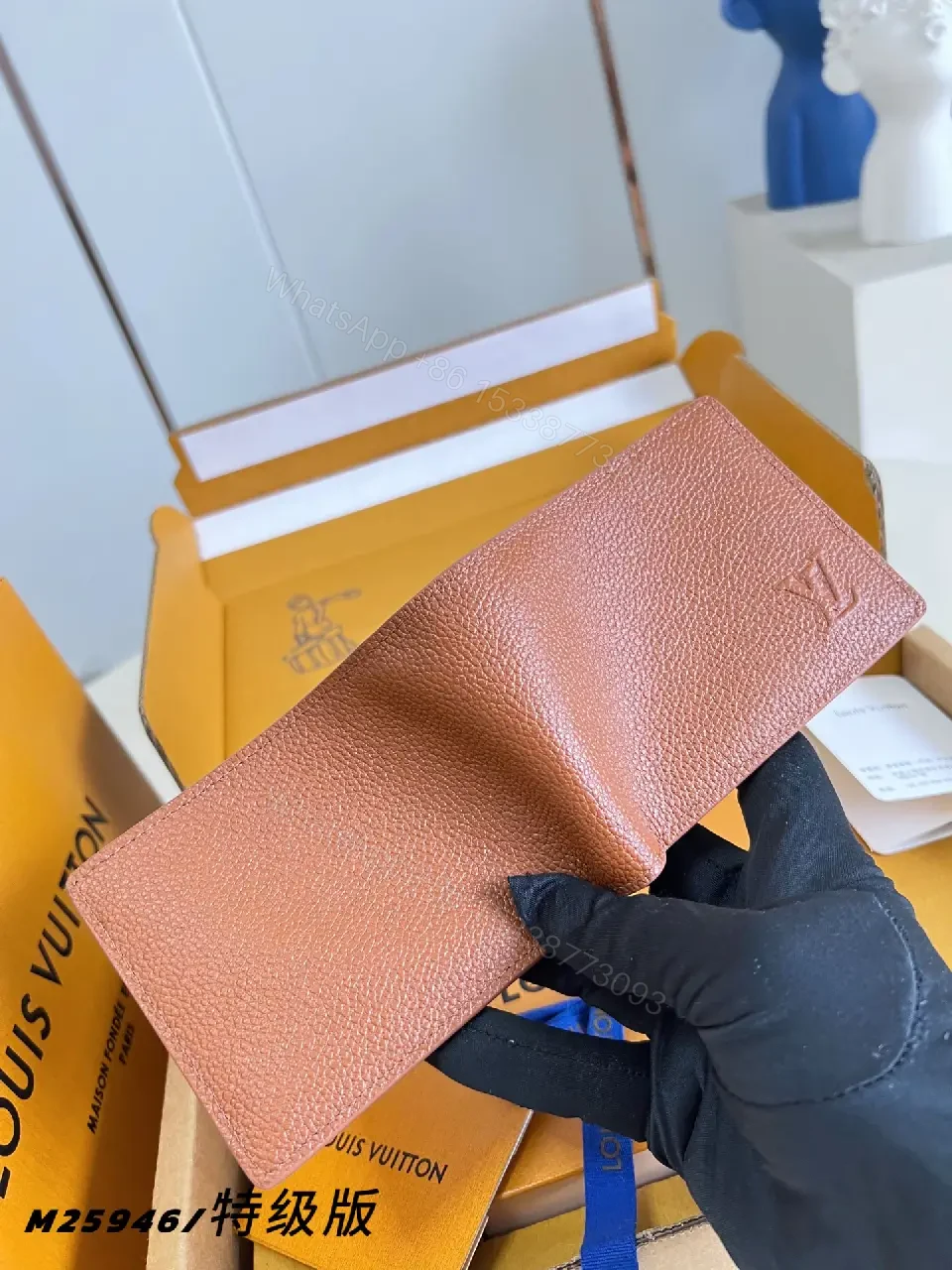 View 6 of Pink-Peach Pebbled Leather Bi-fold Wallet with LV Logo