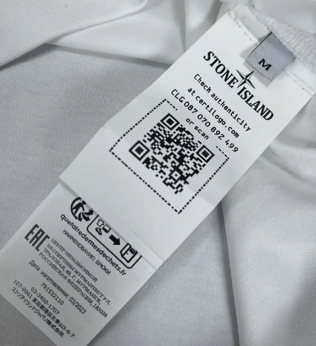 View 8 of Minimalist White Tee with Subtle Logo – Premium Everyday Comfort