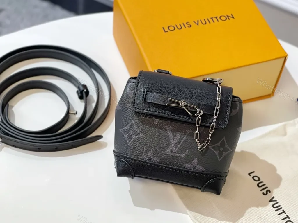 View 4 of Monogram Mini Bag: Compact Luxury Crossbody Bag with Chain