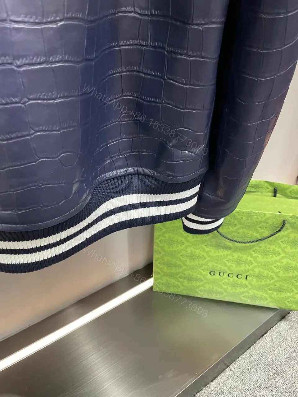 View 9 of Bold Navy Quilted Varsity Jacket with LV-Inspired Logo