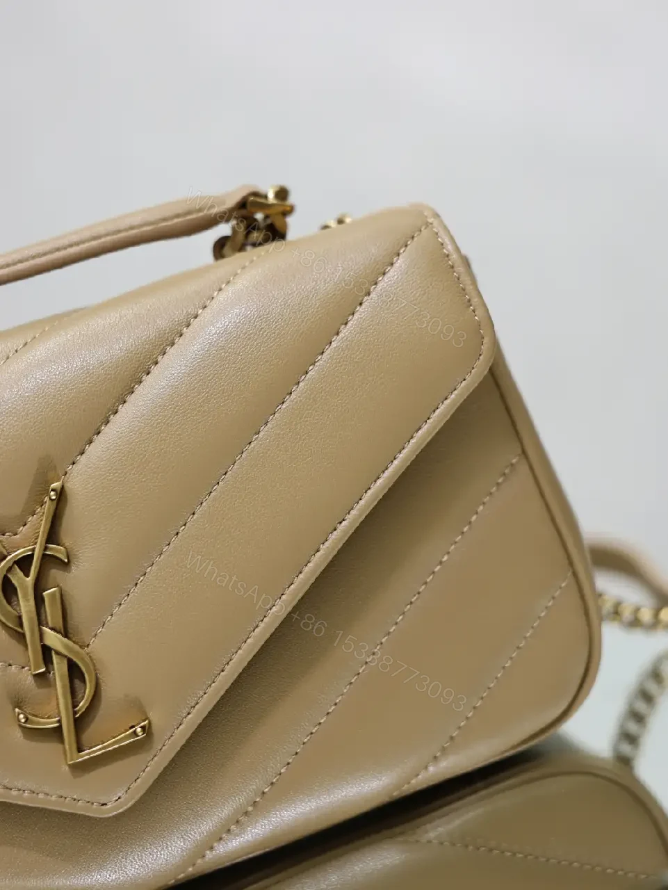 View 9 of Beige Leather Structured Top-Handle Flap Bag with YSL Logo