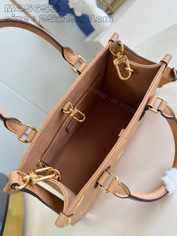 View 9 of Chic Monogram Satchel: Everyday Luxury Tote with Strukturized Carry