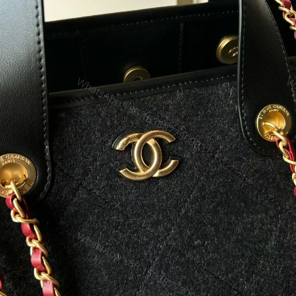 View 9 of Chic Black Quilted Tote with Gold Hardware - Luxury Everyday tote