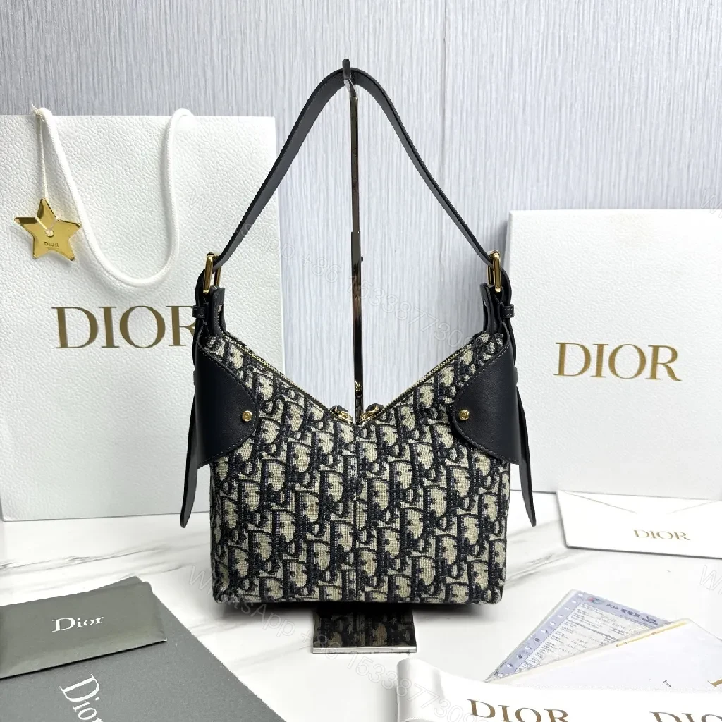 View 7 of Monogram Textured Bucket Bag: Black Leather Trim, Gold Hardware, Medium