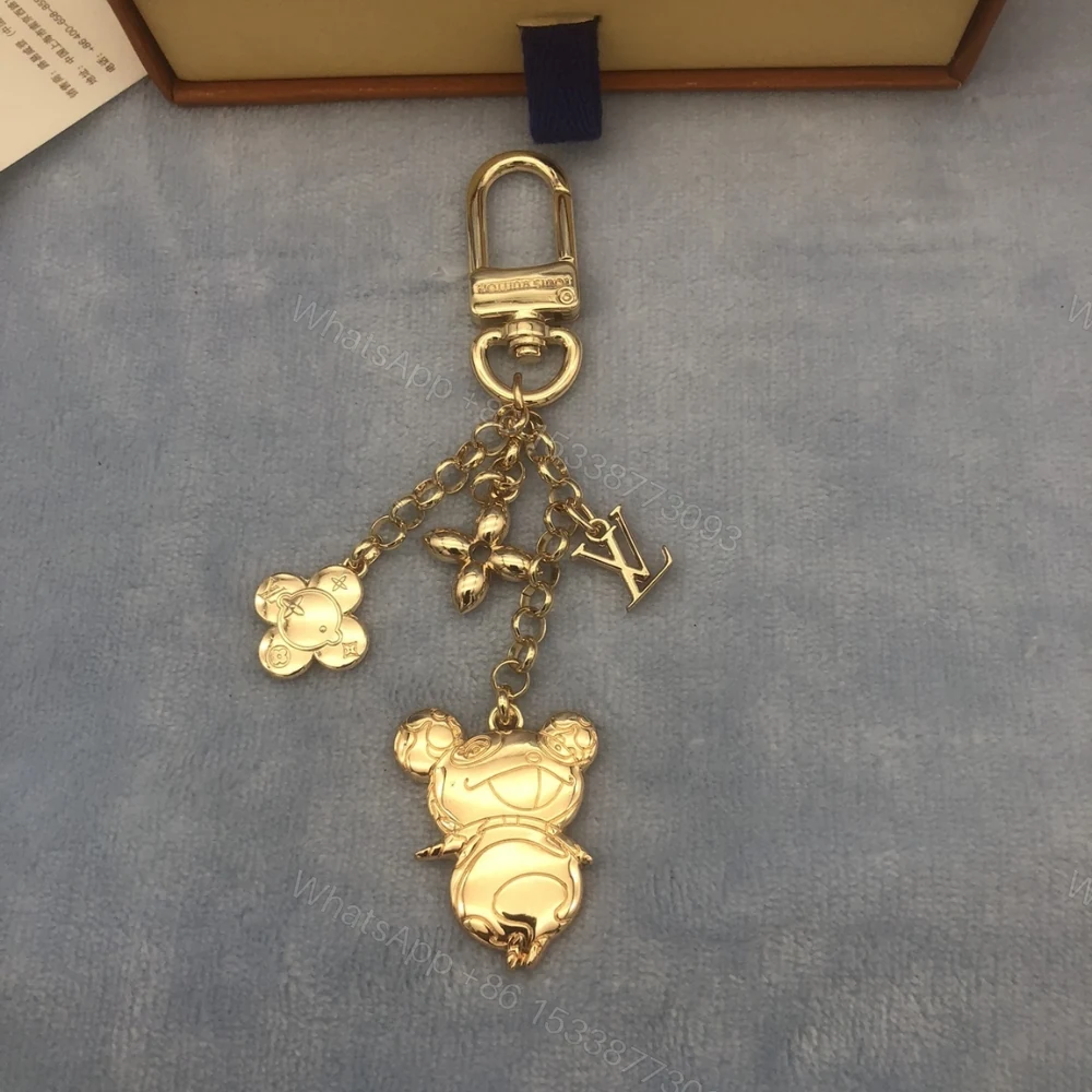 View 11 of Louis Vuitton Lv Bag Charm Key Holder