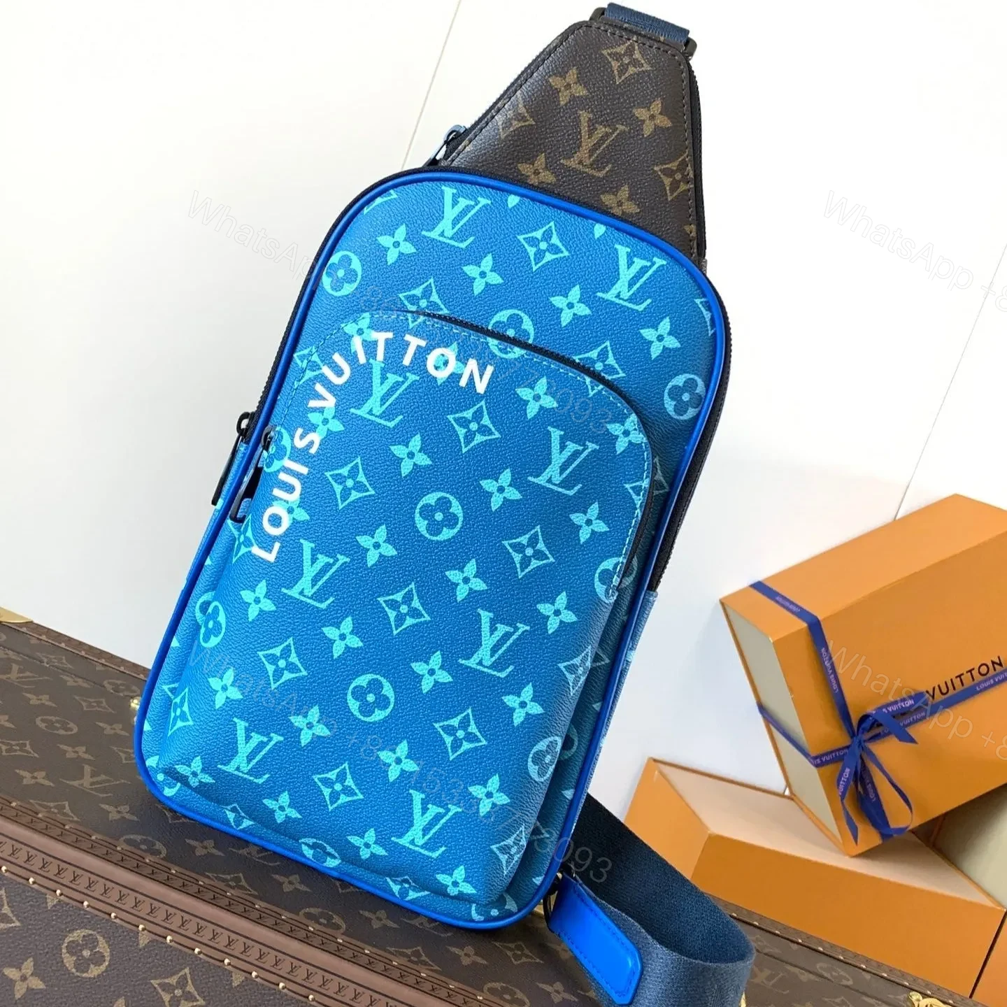 LV AVENUE SLINGBAG 31 IN BLUE AND BROWN TAIGA LEATHER — view 1