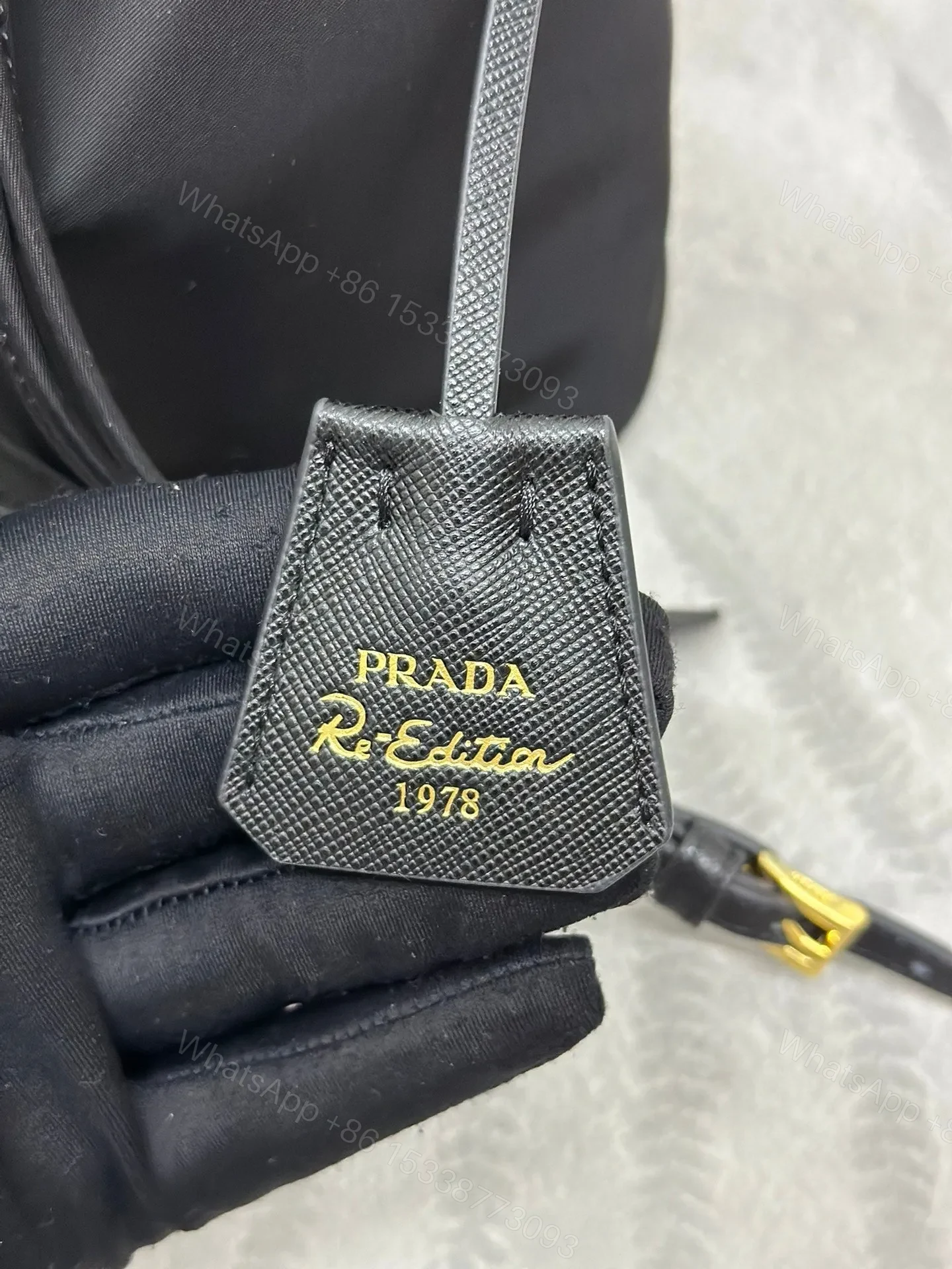 View 6 of BUCKET BAG 19 IN BLACK RE-NYLON AND CALFSKIN HANDLE