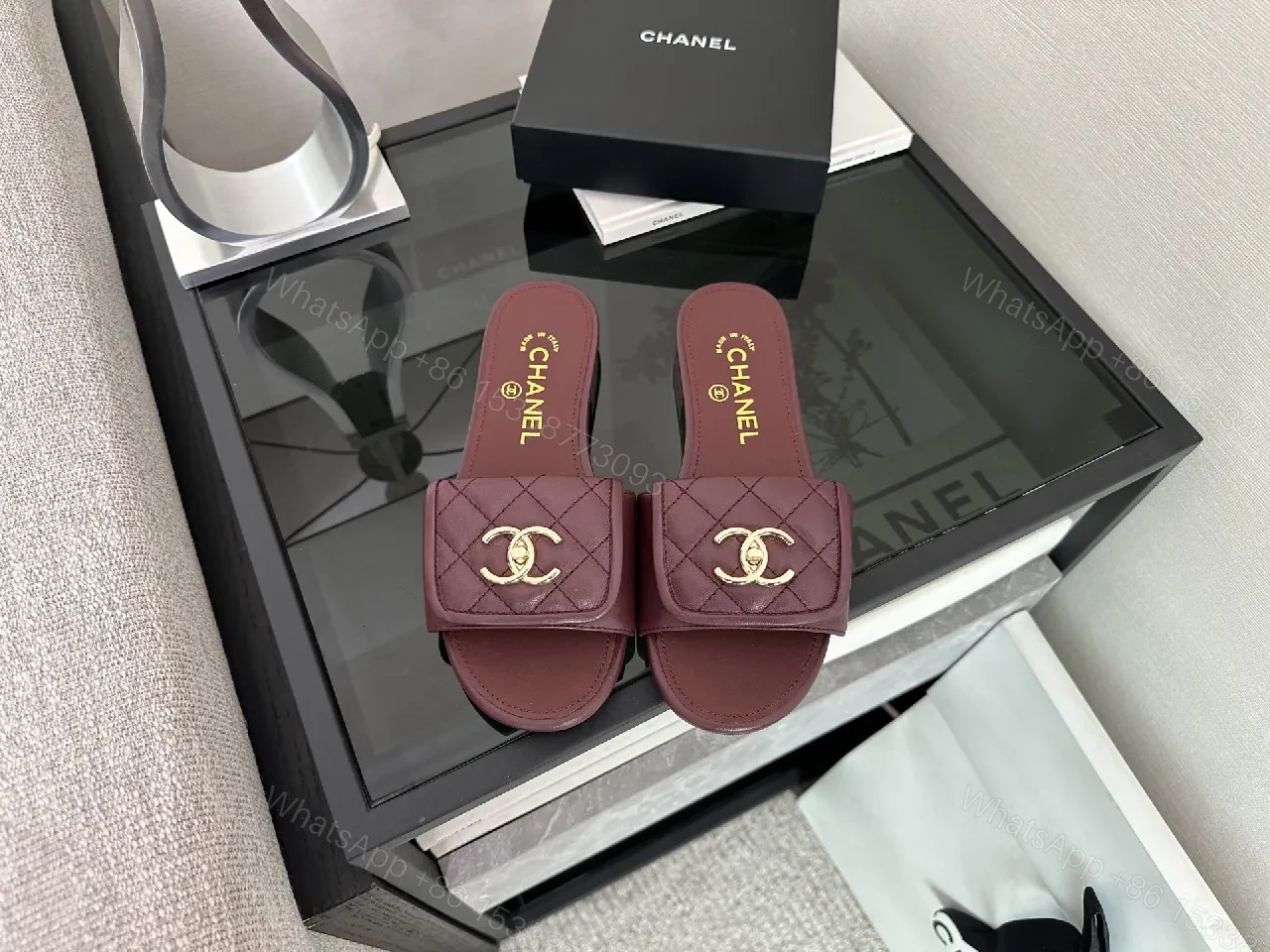 Rich Burgundy Quilted Slip-Ons with Gold Emblem — view 1
