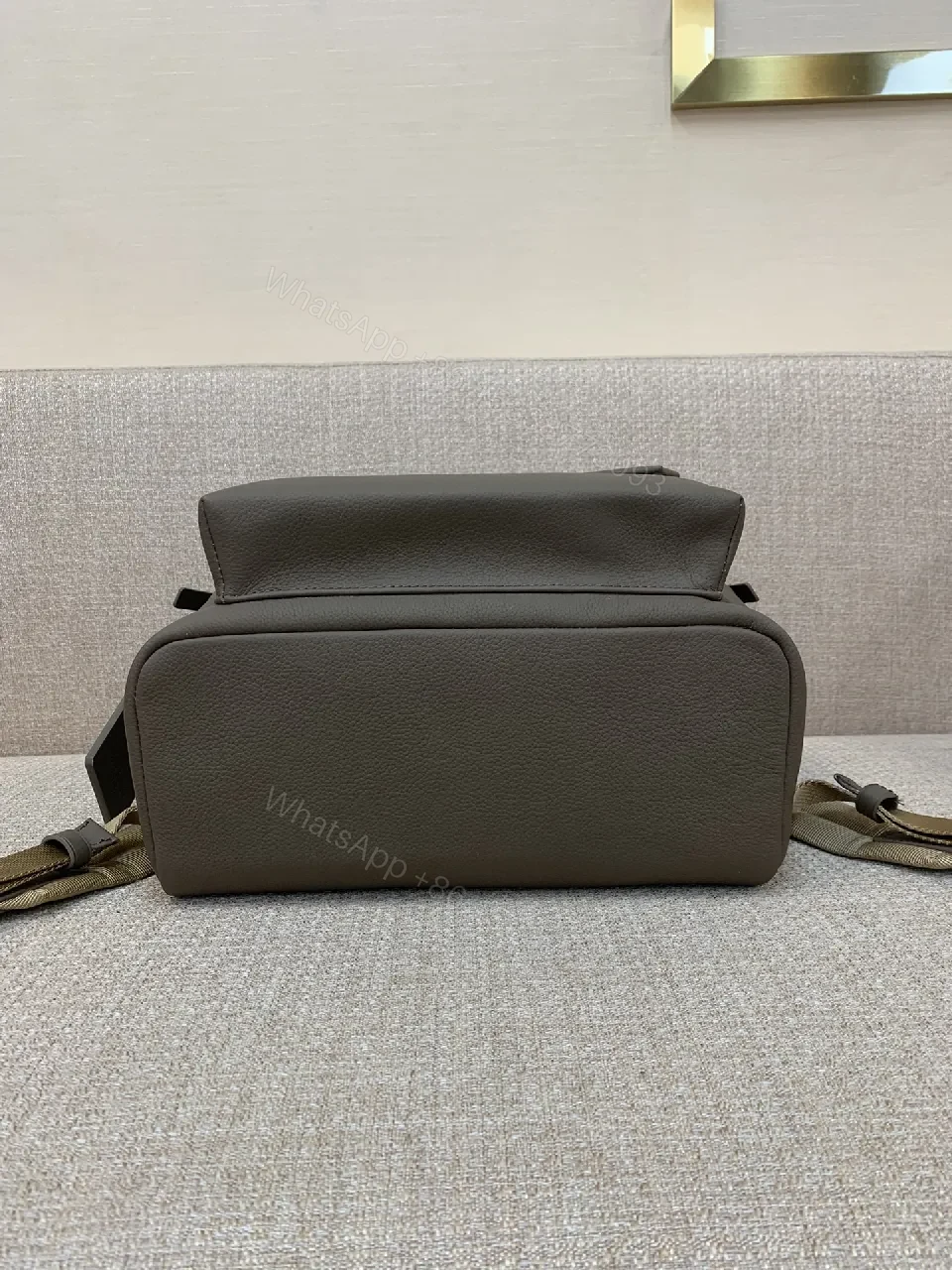 View 6 of Structured Minimalist Leather Backpack with Subtle LV Motif