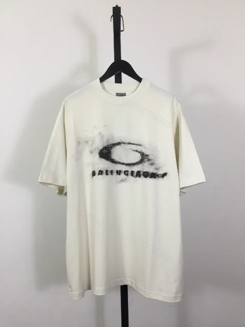 View 4 of Ivory Cotton Oversized Tee – Distressed Logo Streetwear Edge