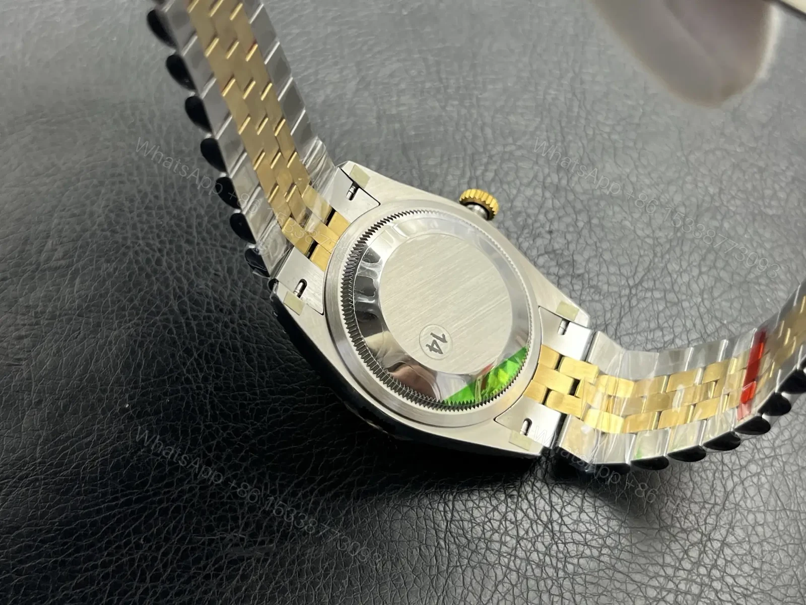 View 9 of Rolex Datejust 36 Stainless Steel Yellow Gold Fluted Champagne Palm Diamond Jubilee 126233-0043