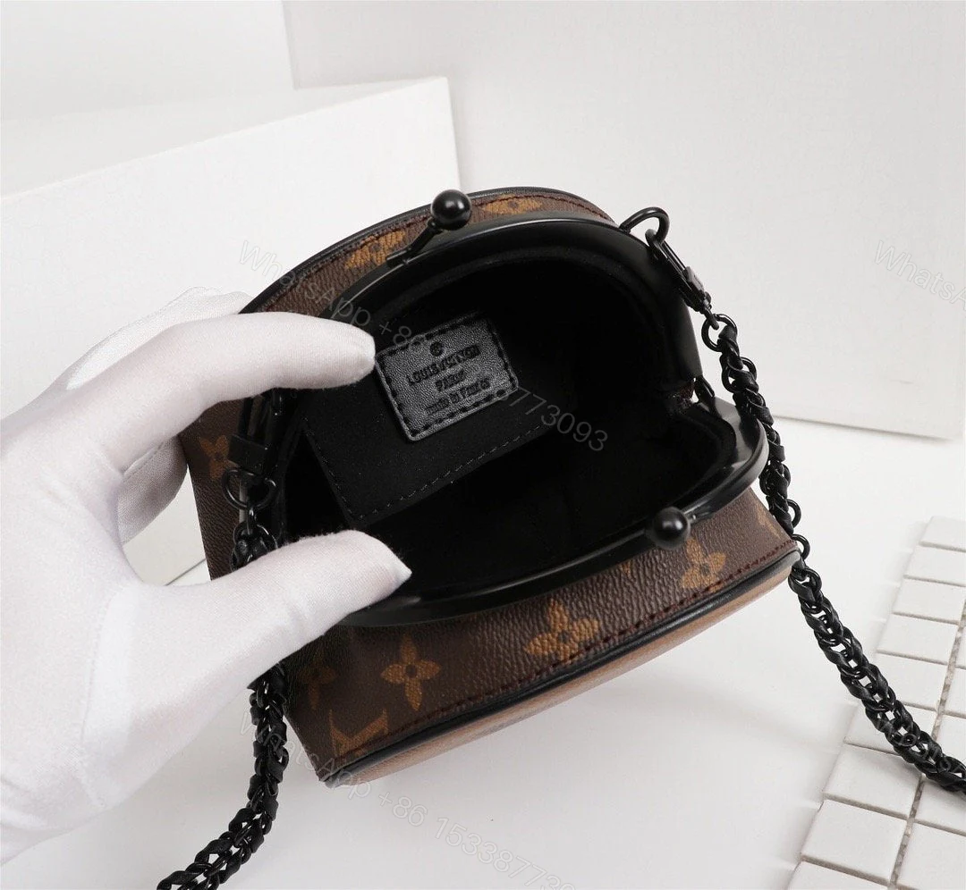 View 9 of Louis Vuitton Boursicot Boite Chapeau Bag